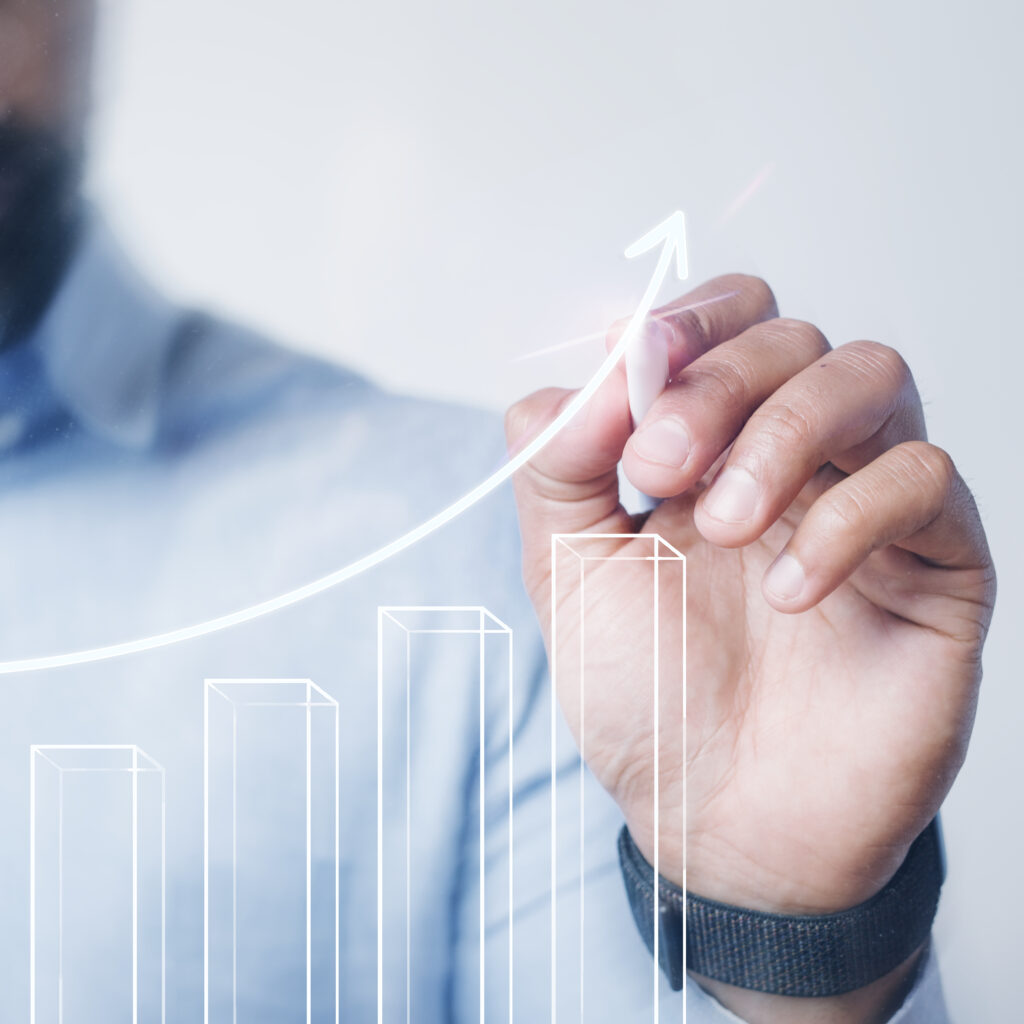 man giving bar graph presentation using high technology digital pen